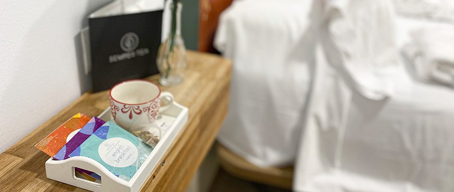 Bandeja de bienvenida con té ecológico premium para huéspedes Bandeja de bienvenida con té ecológico premium para huéspedes