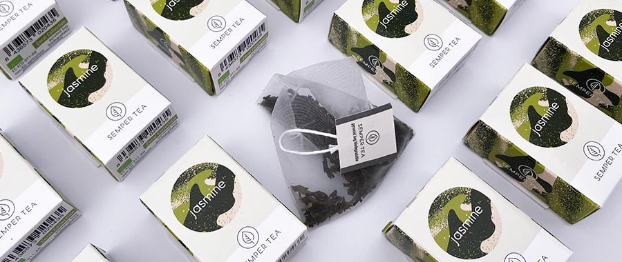 Organic Jasmine Green Tea with delicate jasmine flowers and a floral aroma