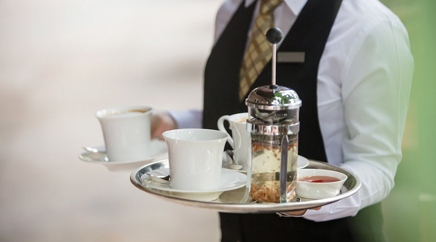Café staff taking part in a Semper Tea training session on teas and herbal infusions.